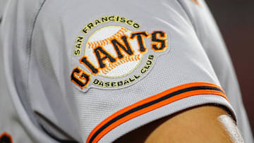 Jul 18, 2023; Cincinnati, Ohio, USA; The San Francisco Giants logo on the sleeve of right fielder Michael Conforto (8) during the fifth inning against the Cincinnati Reds at Great American Ball Park. Mandatory Credit: Katie Stratman-Imagn Images
