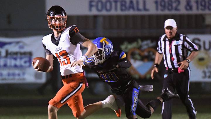 Brady Hart of Cocoa is pursued by Titusville’s Dwight Jenkins during their District 12-2S football game Friday, October 13, 2023.