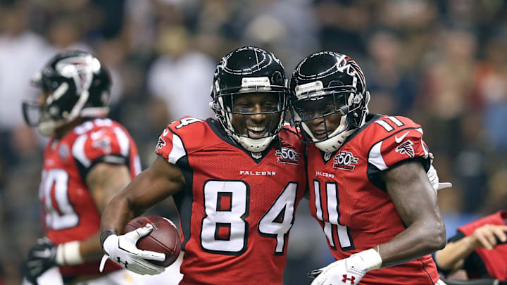 Oct 15, 2015; New Orleans, LA, USA; Atlanta Falcons wide receiver Roddy White (84) celebrates with wide receiver Julio Jones (11) after his touchdown catch in the second quarter against the New Orleans Saints of their game at the Mercedes-Benz Superdome. Mandatory Credit: Chuck Cook-Imagn Images
