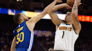 Feb 25, 2024; San Francisco, California, USA; Denver Nuggets forward Michael Porter Jr. (1) shoots over Golden State Warriors guard Stephen Curry (30) during the fourth quarter at Chase Center. Mandatory Credit: D. Ross Cameron-Imagn Images