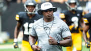 Iowa wide receivers coach Kelton Copeland runs with players between drills during a Hawkeyes football Kids Day scrimmage, Saturday, Aug. 10, 2019, at Kinnick Stadium in Iowa City, Iowa.

190810 Kids Day 033 Jpg