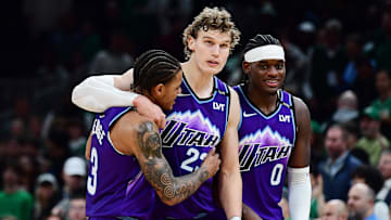 Nov 3, 2025; Boston, Massachusetts, USA; Utah Jazz guard Keyonte George (3), forward Lauri Markkanen (23), and forward Taylor Hendricks (0) react during the second half against the Boston Celtics at TD Garden. Mandatory Credit: Bob DeChiara-Imagn Images