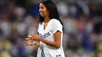 Bryant, daughter of former Los Angeles Lakers player Kobe Bryant reacts before throwing out the ceremonial first pitch at Dodger Stadium.