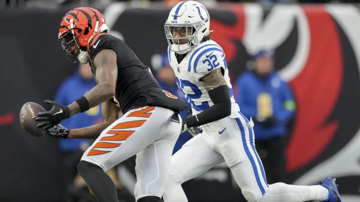 Dec 10, 2023; Cincinnati, Ohio, USA; A pass intended for Cincinnati Bengals wide receiver Tee Higgins (5) goes incomplete as Indianapolis Colts safety Julian Blackmon (32) gives chase at Paycor Stadium. Mandatory Credit: Bob Scheer-USA TODAY Sports