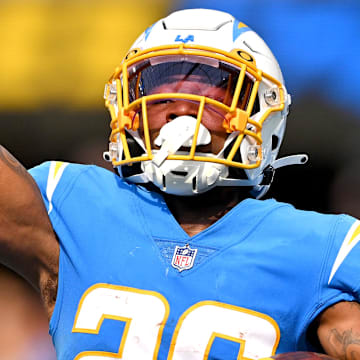 Sep 11, 2022; Inglewood, California, USA; Los Angeles Chargers cornerback Asante Samuel Jr. (26) celebrates after an interception in the end zone in the third quarter against the Las Vegas Raiders at SoFi Stadium. Mandatory Credit: Jayne Kamin-Oncea-Imagn Images