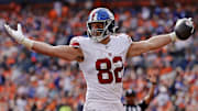 Oct 19, 2025; Denver, Colorado, USA; New York Giants tight end Daniel Bellinger (82) celebrates after scoring a touchdown during the first half against the Denver Broncos.