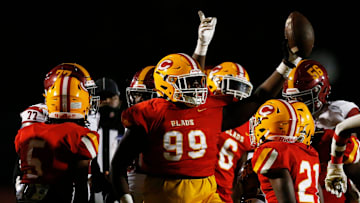 Clarke Central's Jaylon Stone (99) celebrates after recovering a fumble during a GHSA high school football game between Jackson and Clarke Central in Athens, Ga., on Friday, Nov. 12, 2021.