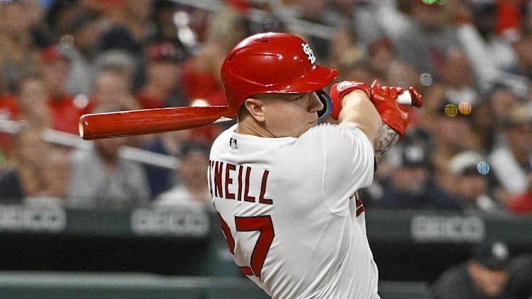 Aug 5, 2022; St. Louis, Missouri, USA;  St. Louis Cardinals left fielder Tyler O'Neill (27) hits a