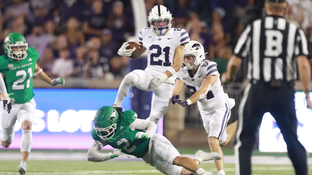 Kansas State Wildcats wide receiver Bryce Noernberg (21) avoids a tackle during the second half against the North Dakota Fighting Hawks at Bill Snyder Family Stadium on Aug. 30, 2025.