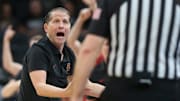 USC Trojans head coach Eric Musselman talks to an official Thursday, March 13, 2025, during the Big Ten Men’s Basketball Tournament game against the Purdue Boilermakers at Gainbridge Fieldhouse in Indianapolis. Purdue Boilermakers won 76-71.