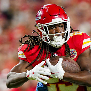 Kansas City Chiefs running back Kareem Hunt (29) is tackled by Detroit Lions safety Kerby Joseph (31) 