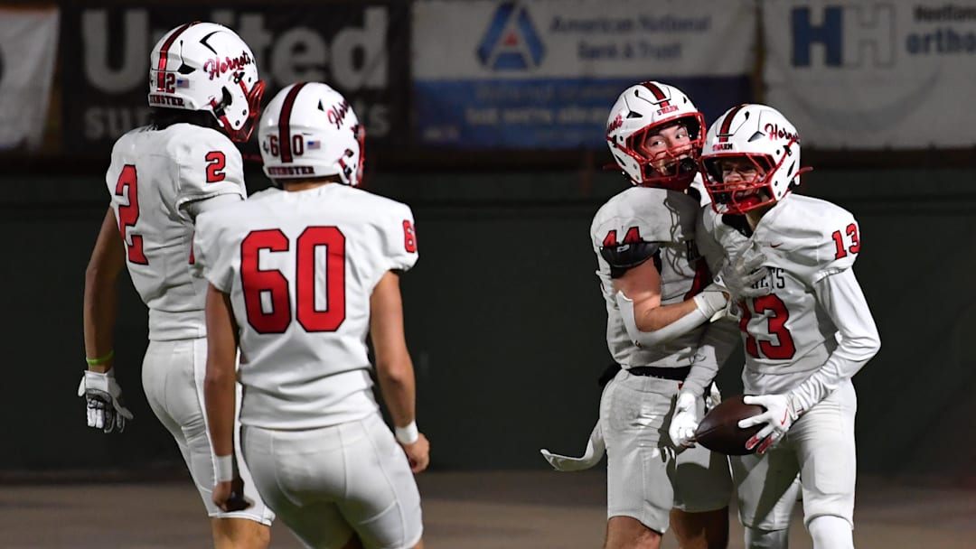 Muenster's Clayton Cunningham (13) scores a touchdown during a playoff game against Lindsay on Friday, Dec. 5, 2025 at Memorial Stadium.