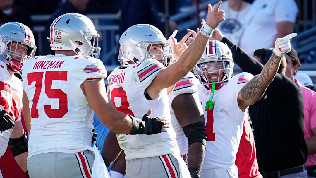Ohio State Buckeyes quarterback Will Howard (18) celebrates a first down run during the NCAA football game against the Penn State Nittany Lions at Beaver Stadium in University Park, Pa. on Monday, Nov. 4, 2024. Ohio State won 20-13.