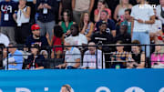 Team USA basketball stars spectate in the stands at the 2024 Summer Olympics.