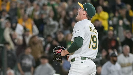 Apr 25, 2025; West Sacramento, California, USA; Athletics pitcher Mason Miller (19) celebrates after defeating the Chicago White Sox at Sutter Health Park. Mandatory Credit: Ed Szczepanski-Imagn Images