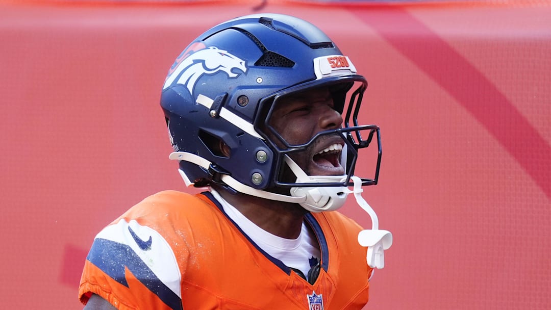 Nov 16, 2025; Denver, Colorado, USA;  Denver Broncos wide receiver Marvin Mims Jr. (19) reacts after a punt return against the Kansas City Chiefs during the first quarter of the game at Empower Field at Mile High. Mandatory Credit: Ron Chenoy-Imagn Images