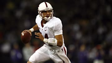Sept 27, 2008; Seattle, WA, USA; Stanford Cardinal quarterback Tavita Pritchard (14) scrambles out of the pocket against the Washington Huskies during the first half at Husky Stadium. Stanford defeated Washington, 35-28. Mandatory Credit: Joe Nicholson-Imagn Images