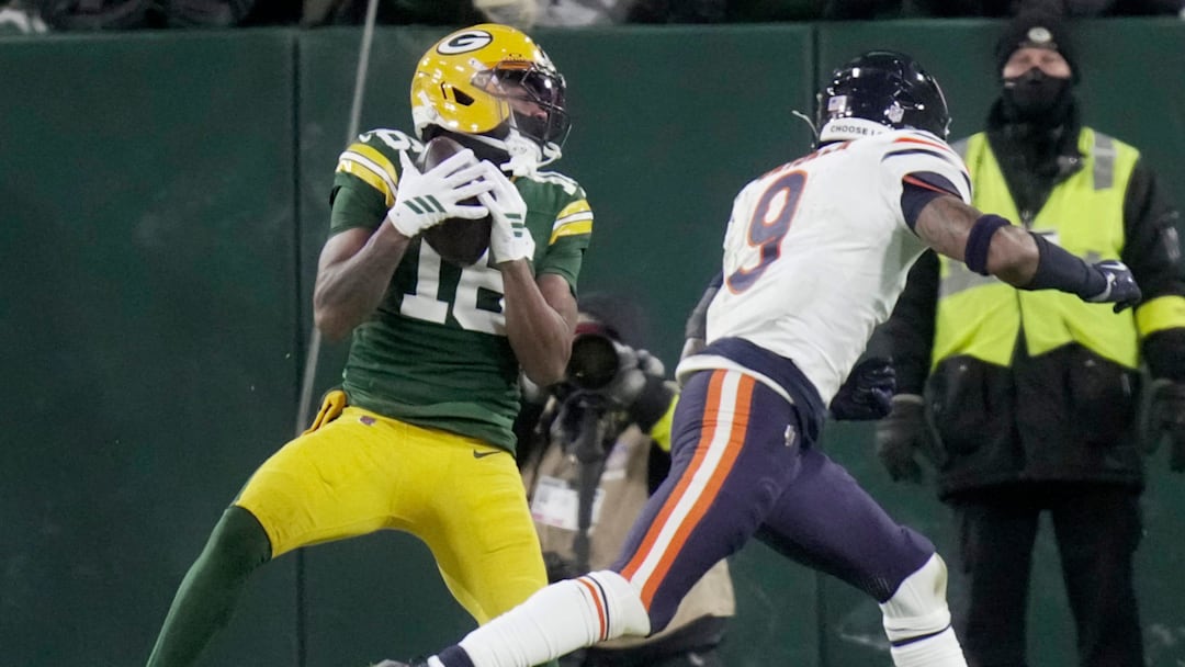 Bo Melton beats Jaquan Brisker for a Green Bay touchdown just before halftime.