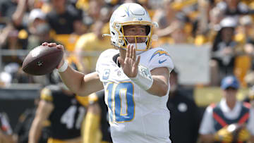 Sep 22, 2024; Pittsburgh, Pennsylvania, USA;  Los Angeles Chargers quarterback Justin Herbert (10) passes against the Pittsburgh Steelers during the second quarter at Acrisure Stadium. Mandatory Credit: Charles LeClaire-Imagn Images