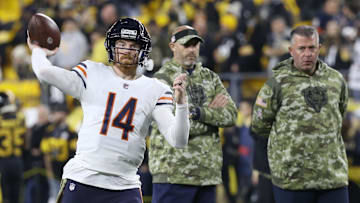 Nov 8, 2021; Pittsburgh, Pennsylvania, USA;  Chicago Bears quarterback Andy Dalton (14) warms up as Bears head coach Matt Nagy (middle) and quarterbacks coach John DeFilippo (right) observe before the game against the Pittsburgh Steelers at Heinz Field. Mandatory Credit: Charles LeClaire-Imagn Images