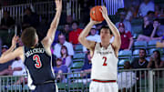 Nov 27, 2024; Paradise Island, Bahamas, BHS; Davidson Wildcats forward Bobby Durkin (2) shoots as Arizona Wildcats guard Anthony Dell'Orso (3) defends during the first half at the Atlantis Resort. 