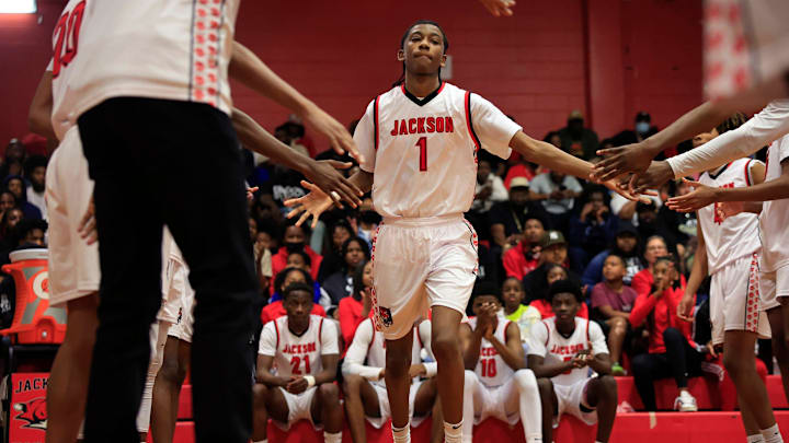Jackson's Jahari Simmons (1) is introduced before a FHSAA District 3-4A boys basketball final matchup Saturday, Feb. 10, 2024 at Andrew Jackson High School in Jacksonville, Fla. The Jackson Tigers defeated the Ribault Trojans 54-45. Jackson's Jahari Simmons (1) is introduced before a FHSAA District 3-4A boys basketball final matchup Saturday, Feb. 10, 2024 at Andrew Jackson High School in Jacksonville, Fla. The Jackson Tigers defeated the Ribault Trojans 54-45.