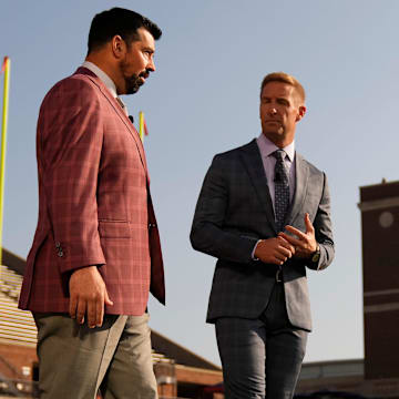 Fox Sports host Joel Klatt talking to Ohio State Buckeyes head coach Ryan Day.