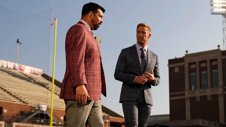 Fox Sports host Joel Klatt talking to Ohio State Buckeyes head coach Ryan Day.