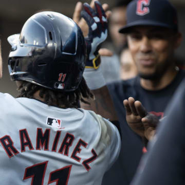 Cleveland Guardians third baseman José Ramírez (11) high fives teammates in the dugout after a home run in the third inning against the Detroit Tigers at Comerica Park on July 29.