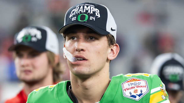 Jan 1, 2024; Glendale, AZ, USA; Oregon Ducks quarterback Austin Novosad (16) against the Liberty Flames during the 2024 Fiest