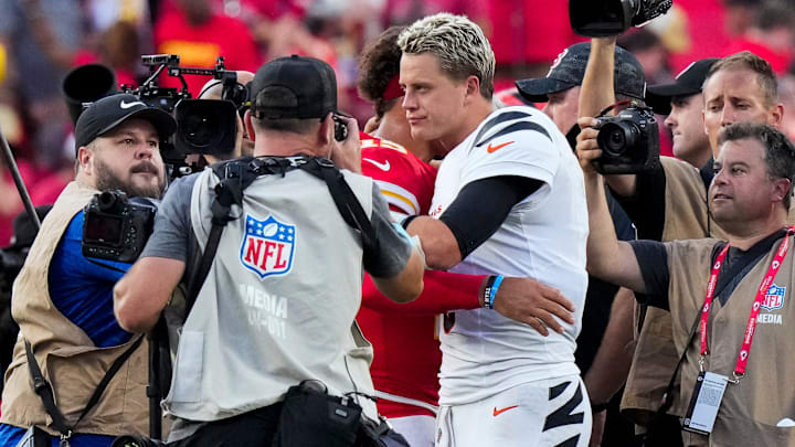 Cincinnati Bengals quarterback Joe Burrow (9) and Kansas City Chiefs quarterback Patrick Mahomes (15) hug at midfield after the fourth quarter of the NFL Week 2 game between the Kansas City Chiefs and the Cincinnati Bengals at Arrowhead Stadium in Kansas City on Sunday, Sept. 15, 2024. The Chiefs took a 26-25 win with a go-ahead field goal as time expired.