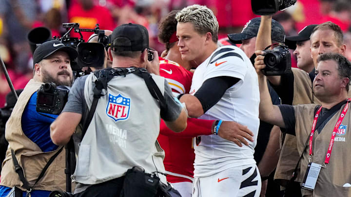 Cincinnati Bengals quarterback Joe Burrow (9) and Kansas City Chiefs quarterback Patrick Mahomes (15) hug at midfield after the fourth quarter of the NFL Week 2 game between the Kansas City Chiefs and the Cincinnati Bengals at Arrowhead Stadium in Kansas City on Sunday, Sept. 15, 2024. The Chiefs took a 26-25 win with a go-ahead field goal as time expired.