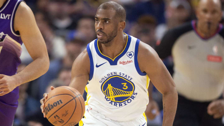 Apr 14, 2024; San Francisco, California, USA; Golden State Warriors guard Chris Paul (3) brings the ball up court against the Utah Jazz during the first quarter at Chase Center.