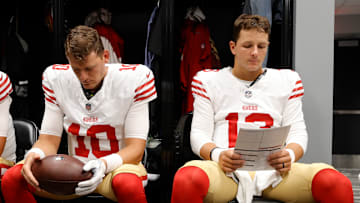 San Francisco 49ers quarterbacks Mac Jones (L) and Brock Purdy (R)