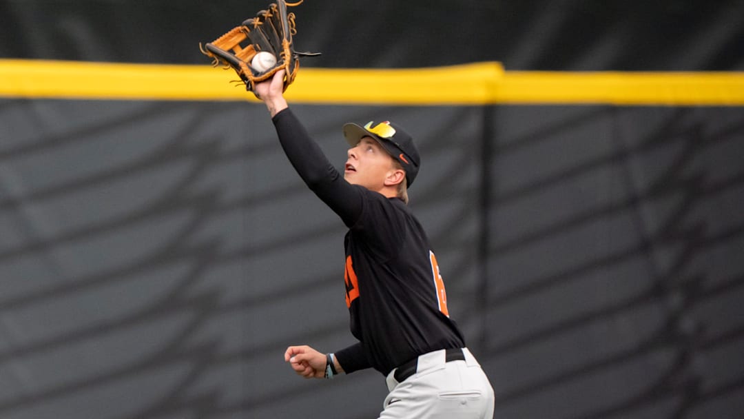 Oregon State outfielder Easton Talt fields the ball for an out as the Oregon Ducks host the Oregon State Beavers on April 25, 2025, at PK Park in Eugene.