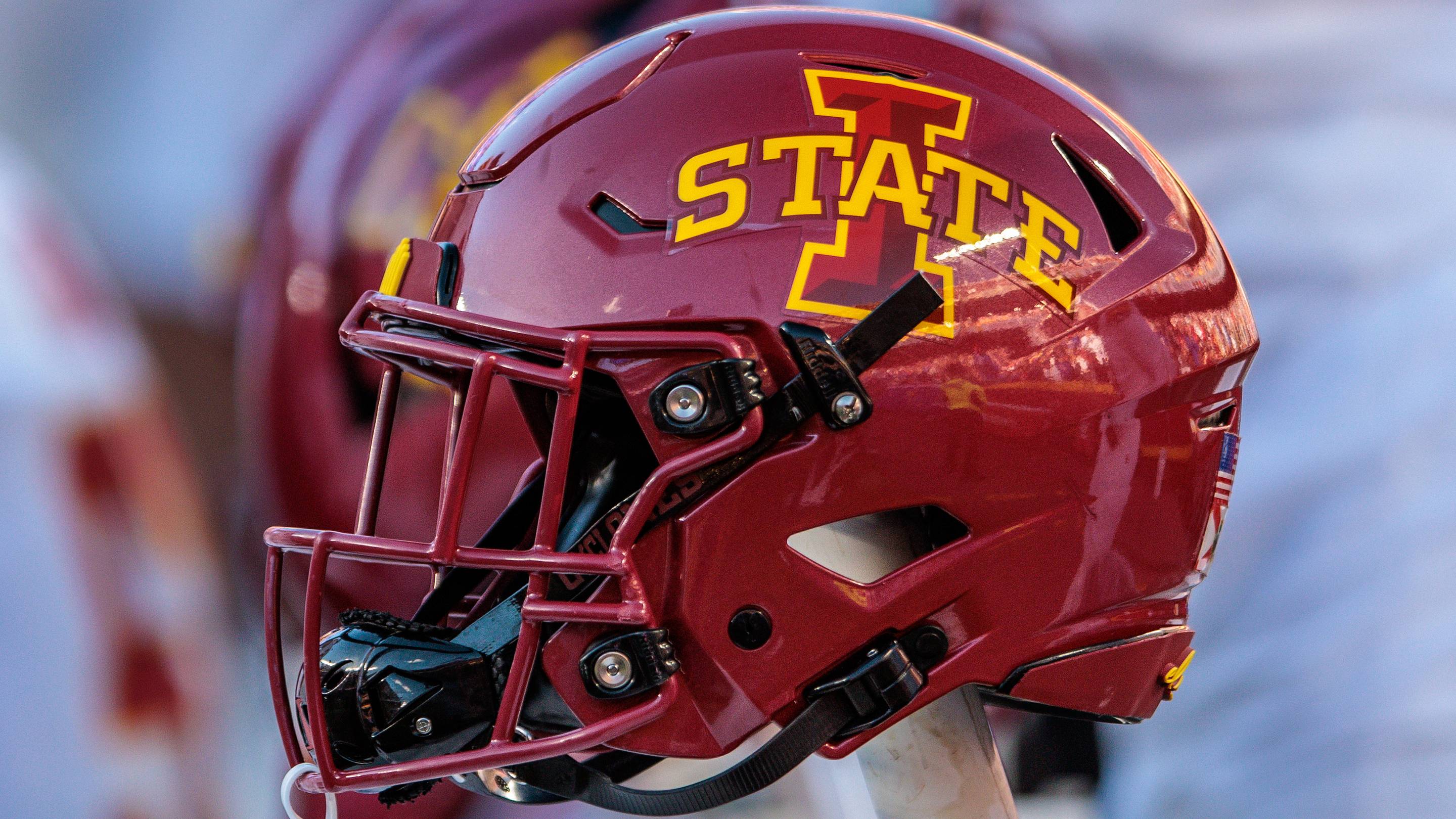 Nov 9, 2024; Kansas City, Missouri, USA; Iowa State Cyclones helmets on the bench during the first quarter against the Kansas Jayhawks at GEHA Field at Arrowhead Stadium. Mandatory Credit: William Purnell-Imagn Images | USA TODAY Sports via Reuters Connect