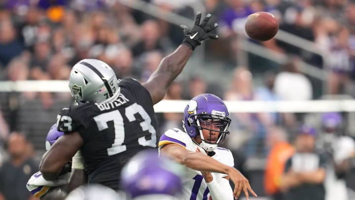 Aug 14, 2022; Paradise, Nevada, USA; Las Vegas Raiders defensive tackle Matthew Butler (73) attempts to block a pass attempt by Minnesota Vikings quarterback Kellen Mond (11) during a preseason game at Allegiant Stadium. Mandatory Credit: Stephen R. Sylvanie-USA TODAY Sports