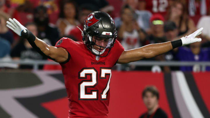 Aug 26, 2023; Tampa, Florida, USA; Tampa Bay Buccaneers safety Kaevon Merriweather (26) break up Baltimore Ravens tight end Charlie Kolar (88) catch as Tampa Bay Buccaneers cornerback Zyon McCollum (27) reacts during the second quarter at Raymond James Stadium. Mandatory Credit: Kim Klement Neitzel-USA TODAY Sports