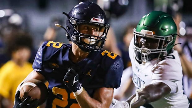 The Naples Golden Eagles compete against the Venice Indians in a spring football game at Staver Field in Naples, Fla., on Tue