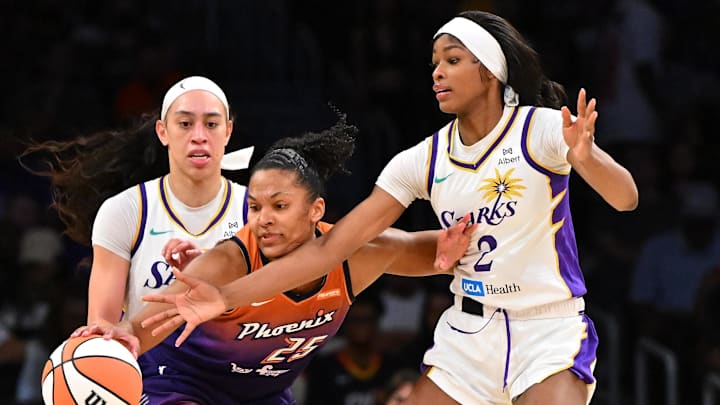 Aug 26, 2025; Los Angeles, California, USA;  Los Angeles Sparks forward Dearica Hamby (5), Phoenix Mercury forward Alyssa Thomas (25) and Los Angeles Sparks forward Rickea Jackson (2) battle for a loose ball during the second half at Crypto.com Arena. Mandatory Credit: Jayne Kamin-Oncea-Imagn Images