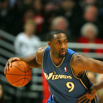 Nov. 13, 2010; Chicago, IL, USA; Washington Wizards point guard Gilbert Arenas (9) being guarded by Chicago Bulls small forward Luol Deng (9) in the second half at the United Center. The Bulls defeated the Wizards 103-96. Mandatory Credit: Dennis Wierzbicki-Imagn Images