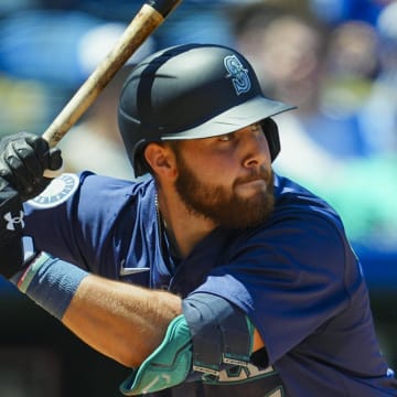 Seattle Mariners first baseman Tyler Locklear (27) bats during the fifth inning against the Kansas City Royals at Kauffman Stadium on June 9.