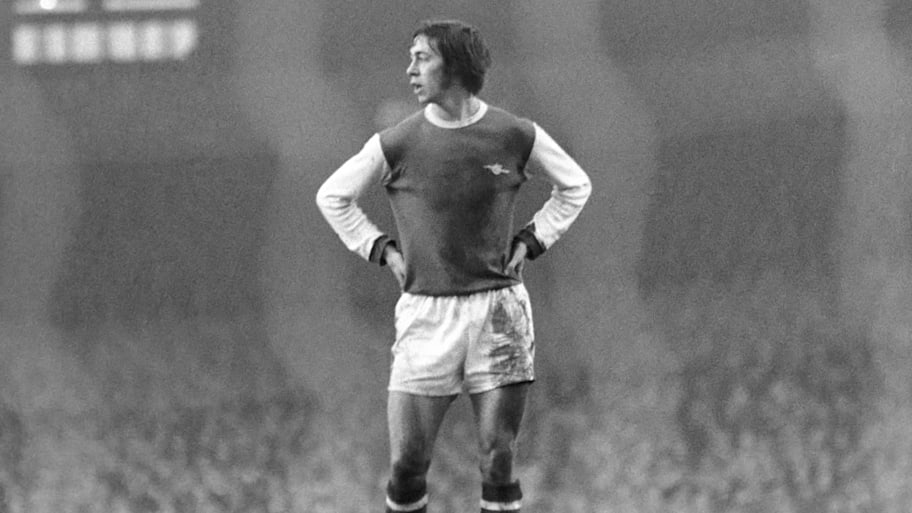 Charlie George with hands on hips.