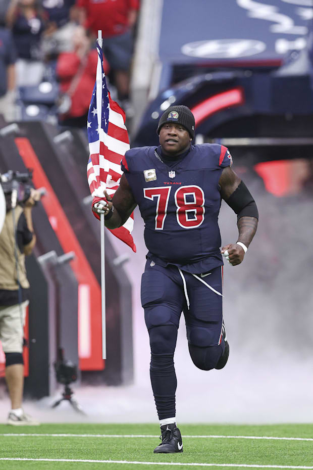 Houston Texans offensive tackle Laremy Tunsil runs onto the field before the game against the Arizona Cardinals Houston Texans offensive tackle Laremy Tunsil runs onto the field before the game against the Arizona Cardinals