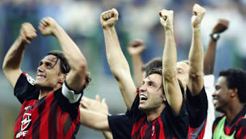 Paolo Maldini of AC Milan celebrates victory with his team mates