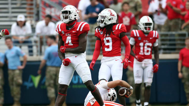 Sep 2, 2023; Oxford, Mississippi, USA; Mississippi Rebels linebacker Suntarine Perkins (4) reacts after sacking Mercer Bears quarterback Carter Peevy (7) during the second half at Vaught-Hemingway Stadium. Mandatory Credit: Petre Thomas-USA TODAY Sports