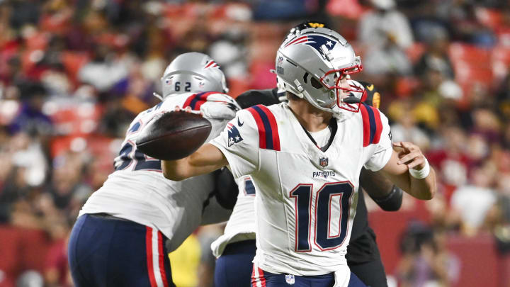 Aug 25, 2024; Landover, Maryland, USA; New England Patriots quarterback Drake Maye (10) throws  during the first half against the Washington Commanders at Commanders Field. Mandatory Credit: Tommy Gilligan-USA TODAY Sports