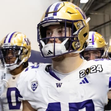 Huskies linebacker Carson Bruener gets ready to face Michigan in the College Football Playoff national championship game at NRG Stadium in Houston. 