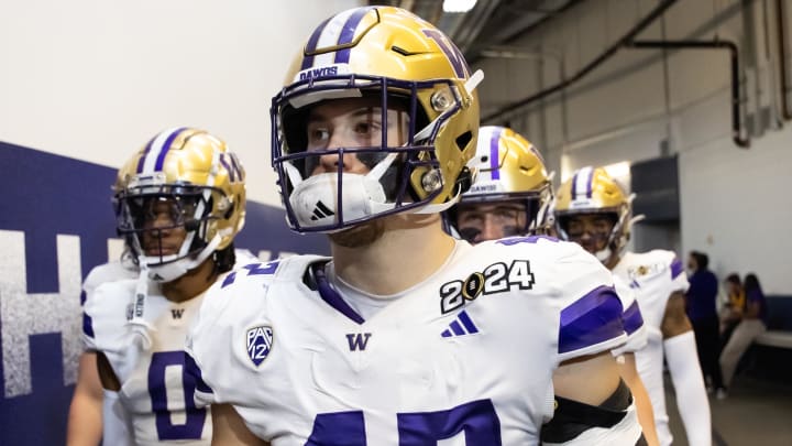 Huskies linebacker Carson Bruener gets ready to face Michigan in the College Football Playoff national championship game at NRG Stadium in Houston. 