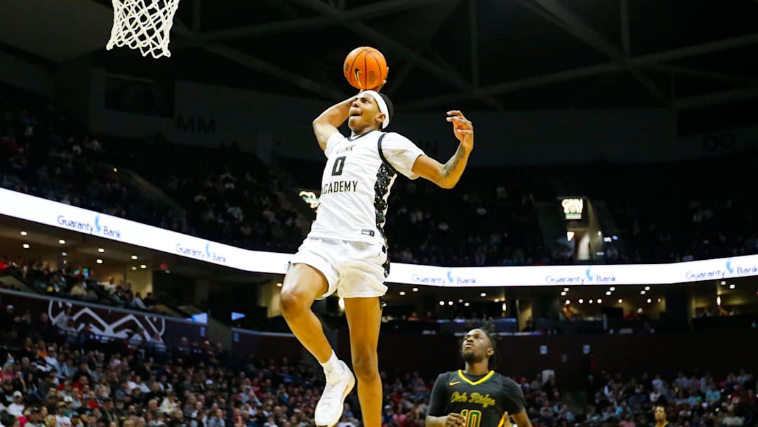 Link Academy's Chris Cenac Jr. dunks the ball as the Lions took on Oak Ridge Pioneers in the championship game of the Bass Pro Tournament of Champions at Great Southern Bank Arena on Saturday, Jan. 18, 2025. Link Academy's Chris Cenac Jr. dunks the ball as the Lions took on Oak Ridge Pioneers in the championship game of the Bass Pro Tournament of Champions at Great Southern Bank Arena on Saturday, Jan. 18, 2025.